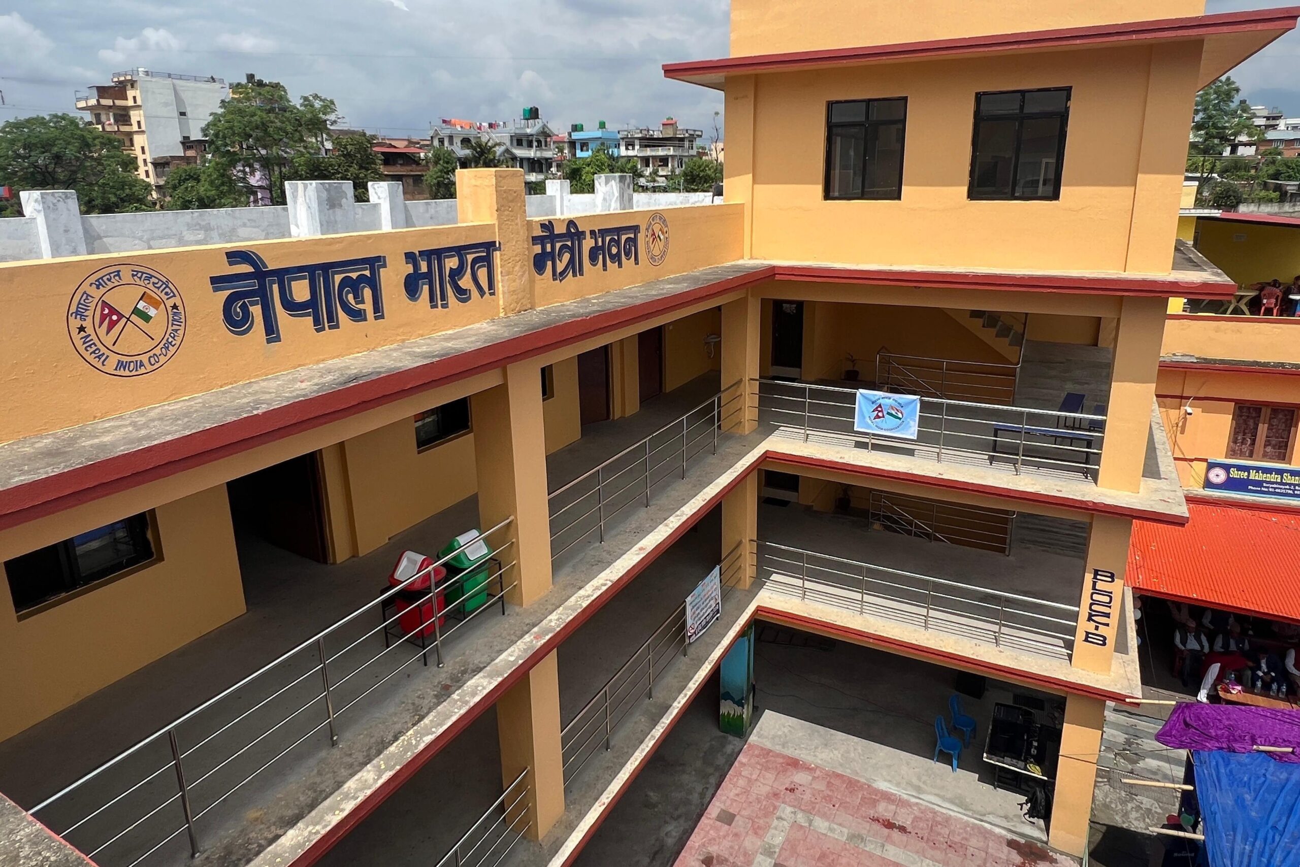 An embassy building in Kathmandu with clear contact information displayed.