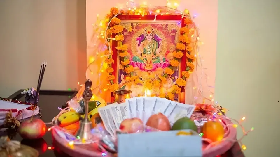 Homes illuminated with oil lamps and festive lights for Laxmi Puja
