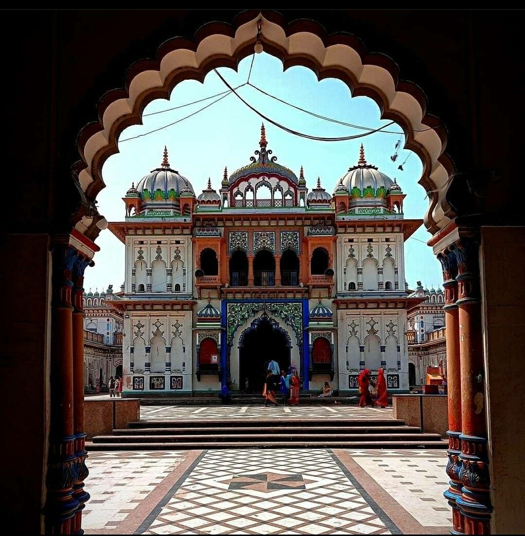 A view of a traditional temple (Ram Mandir) and a busy street in Janakpur