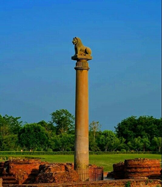 The Ashokan Pillar with ancient ruins and inscriptions in the sacred zone