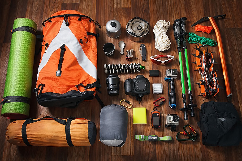 A traveler preparing vaccinations before a Himalayan trek, displaying health kit essentials.