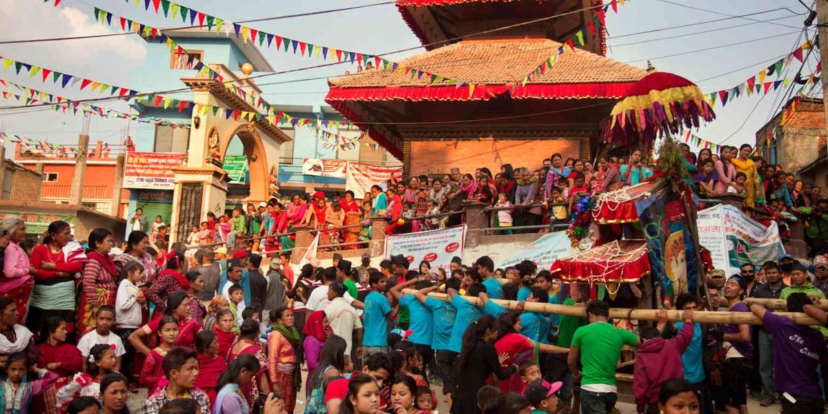 Spectators cheer as the Kumari of Tokha approaches. Spectators cheer as the Kumari of Tokha approaches.